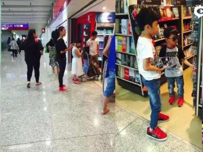 [视频]张柏芝母子三人机场逛书店 温馨穿红鞋