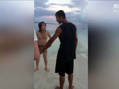 [视频]日本男子关岛海滩乱扔烟头 被当地小哥一拳KO