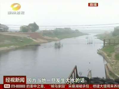 柳林河频现阻洪隐患 围垦围网随处可见